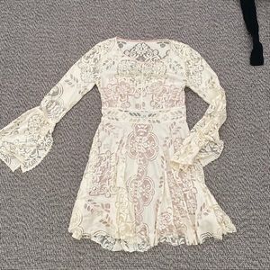 White leave free people cut out dress bell sleeves